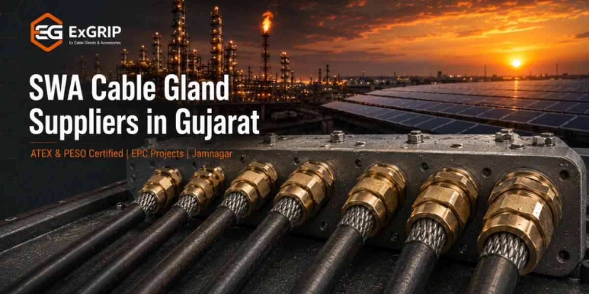 Brass double compression SWA cable glands by Exgrip mounted on armoured cables at a Gujarat EPC project site, with refinery and solar plant in background